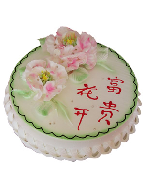 圆形鲜奶蛋糕，两朵鲜奶牡丹花装饰